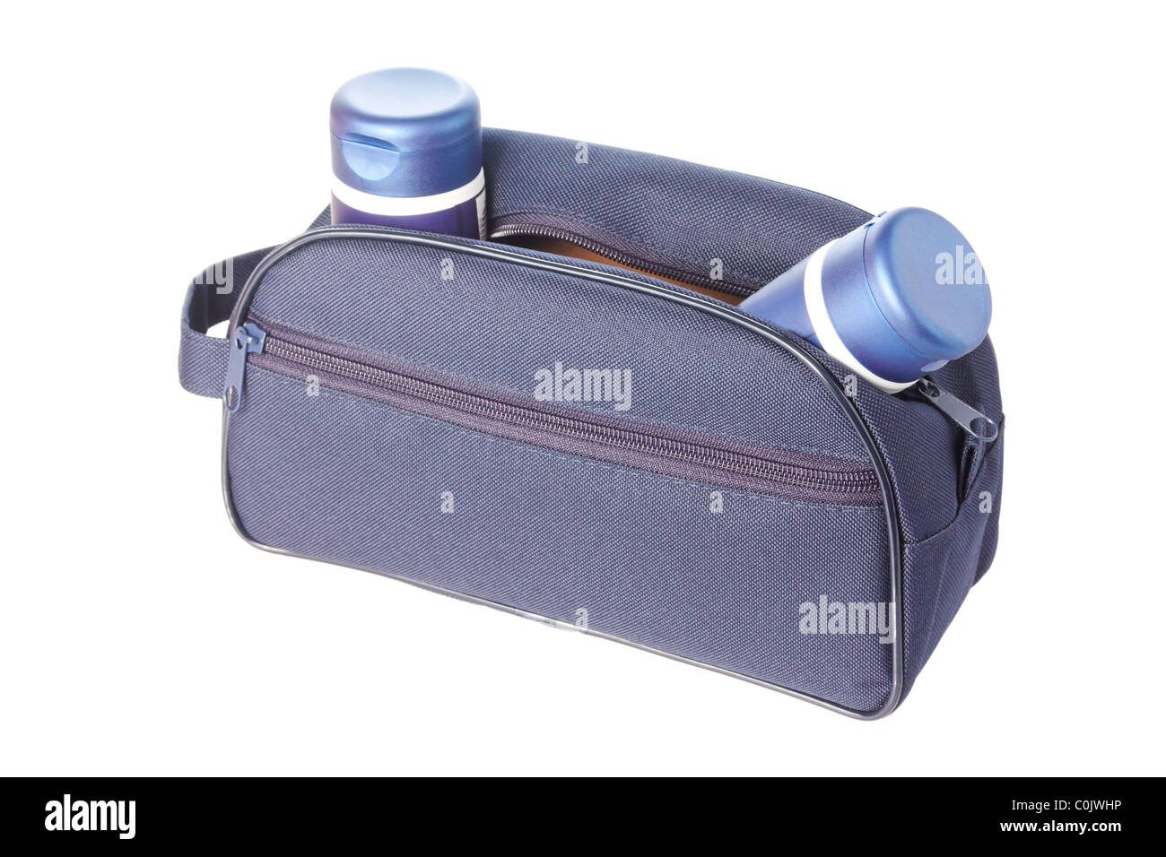 Open blue travel toiletries bag with man`s cosmetics isolated against a white background Stock Photo